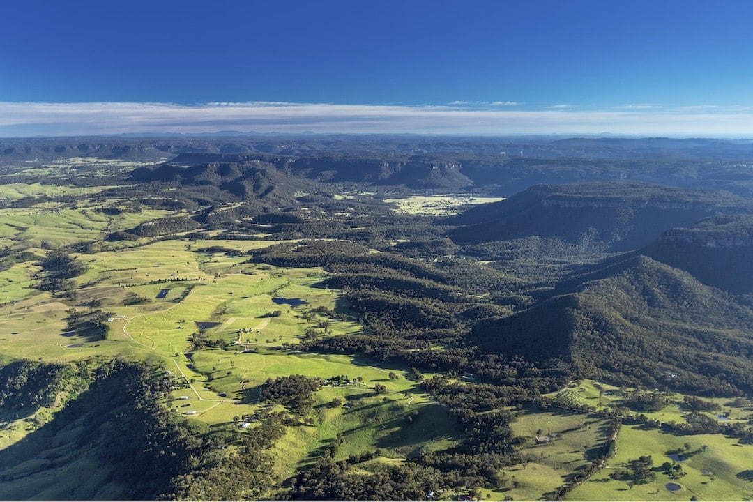 Sun rising over Megalong Valley in the World-Heritage listed Blue Mountains National Park.