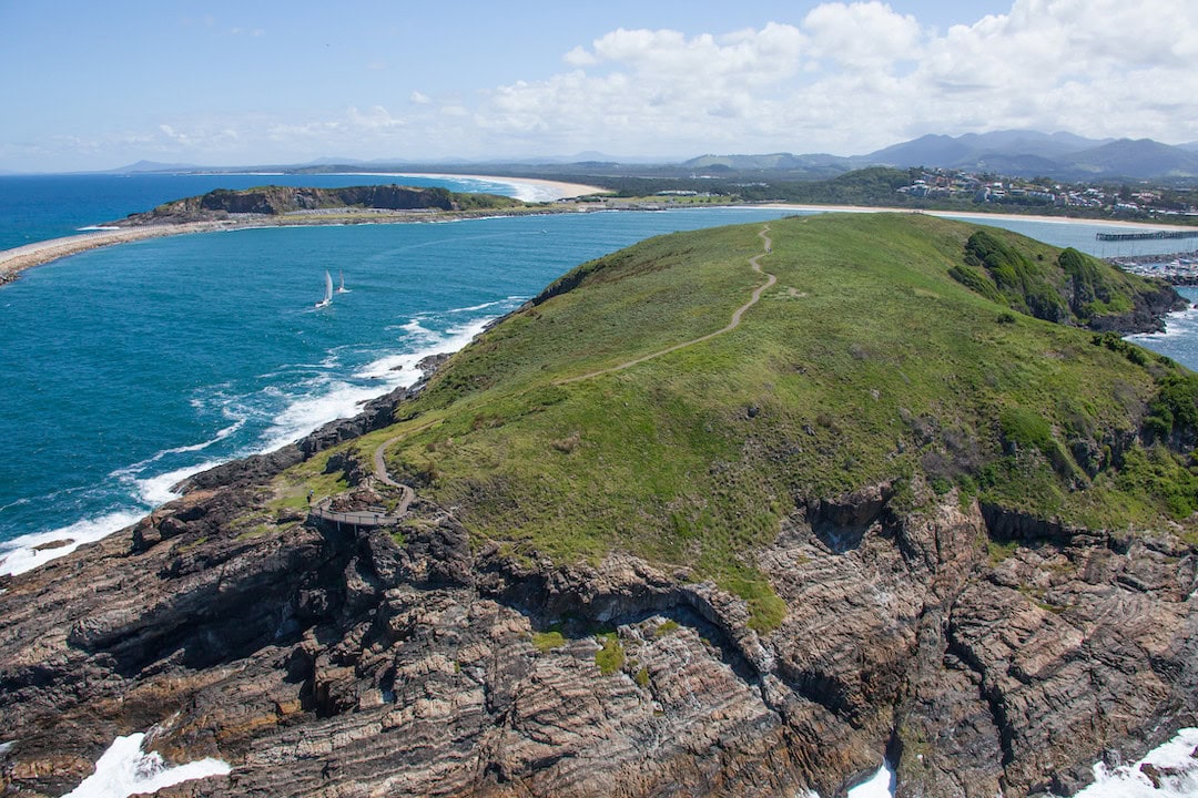 Coastal aerial of Muttonbird Island Nature Reserve. Photo: Destination NSW.