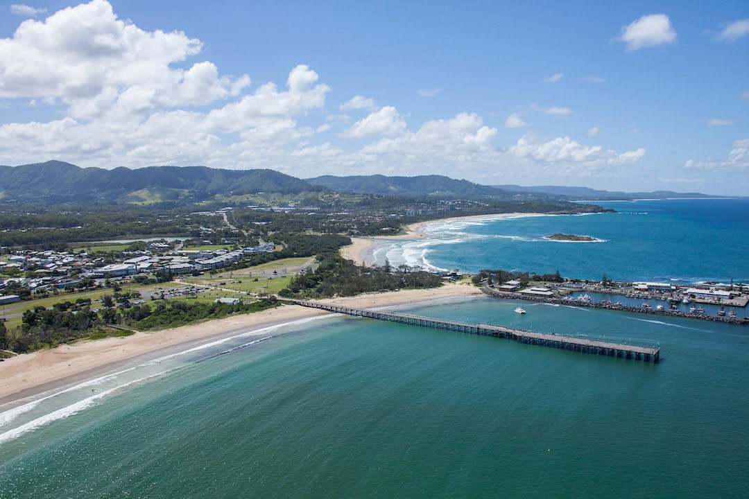 Coastal aerial of Coffs Harbour marina and jetty area. Photo: Destination NSW.