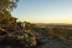 Couple enjoying the scenic views over Griffith from Hermit's Cave and Lookout.
